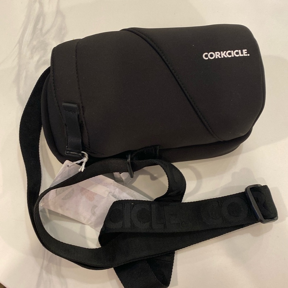 Corkcicle crossbody water bottle sling bag.

Keep your pockets light, hands-free
